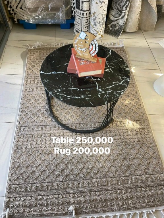 Table 250,000  Rug 200,000